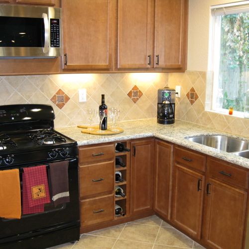 This kitchen started out with out of date cabinets