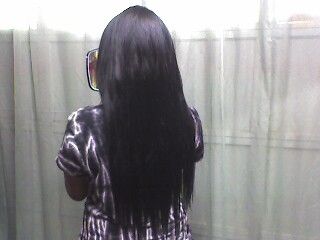 HERE SHE IS WITH HER 18 INCHES LONG EXTENSIONS.
