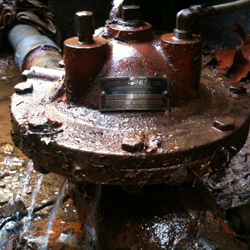 This is a check valve for a well pump system, out 