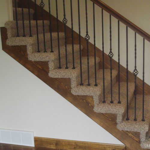 Open sided carpet installation on stairs