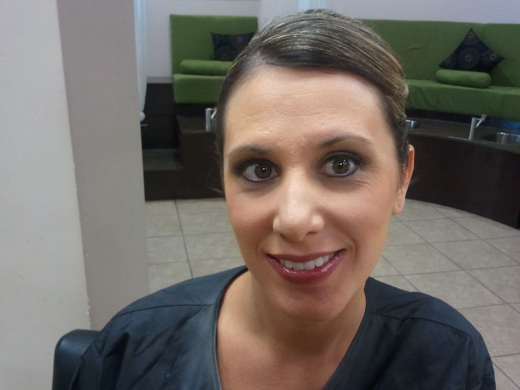 Bridesmaid smiling for the camera