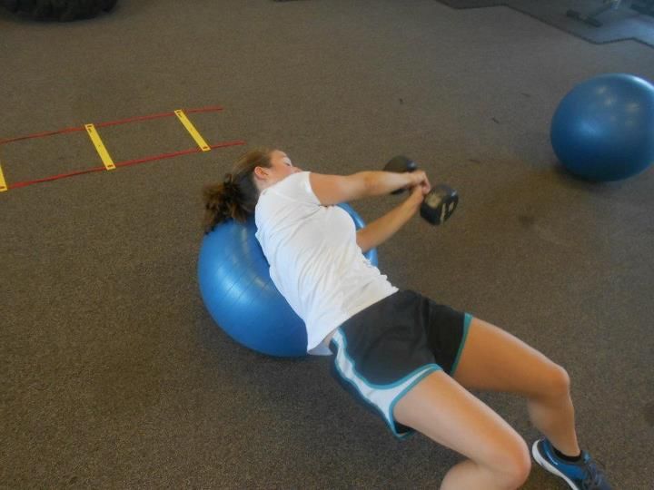An individual working out with the assistance of t