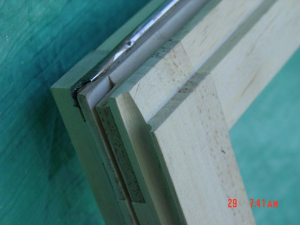 Old wood windows have been replaced with vinyl and