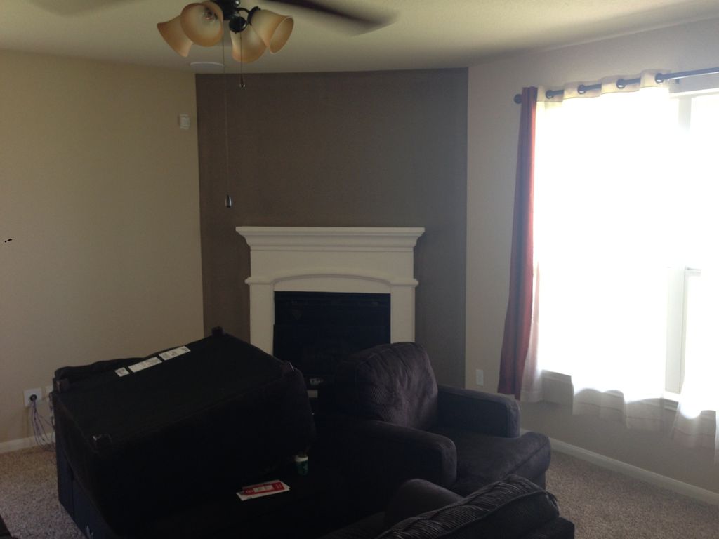 Living room accent wall color at fire place.