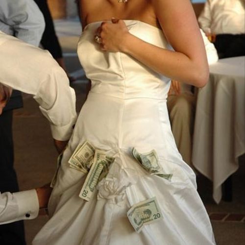 A bride getting pinned at the Money Dance