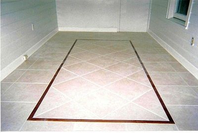 Entrance to home using tile with Cherry Wood Borde
