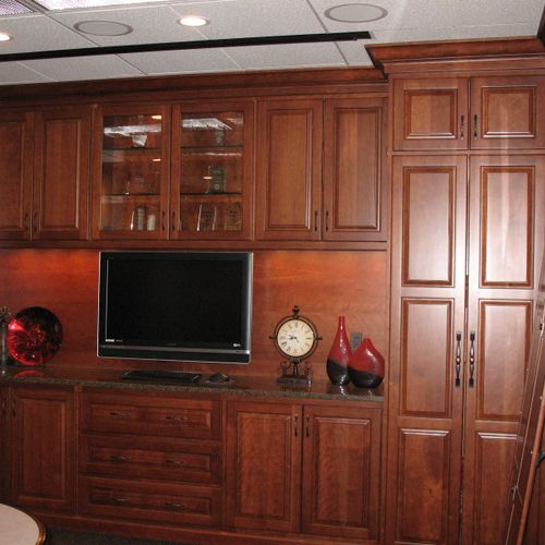Solid cherry cabinets with plenty of storage.  Mol