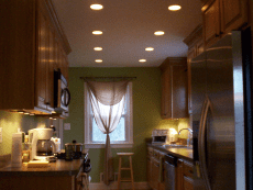 Can lights installed into a higher end kitchen.