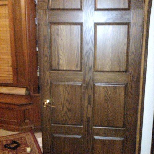 custom reclaimed wood arch panel door for clients 