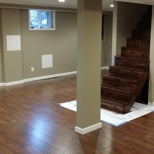 Laminate Flooring in Basement with Sanded & Staine