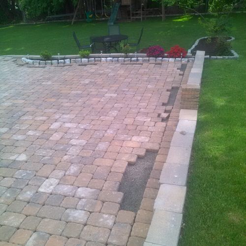 Middle of paver and wall installation job