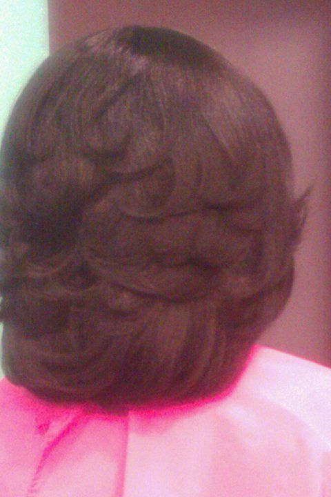 Relaxed hair w/ feathered look