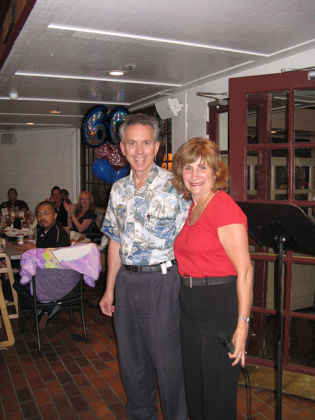 Sylvia and I are at my 60th Birthday/Going Away pa