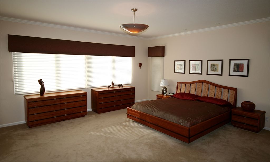 Custom bed and drawers and bed spread and cornice