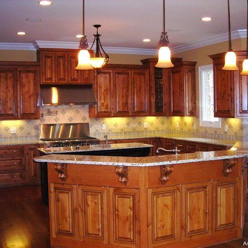 Custom Kitchen Cabinets, Countertops and Lighting.