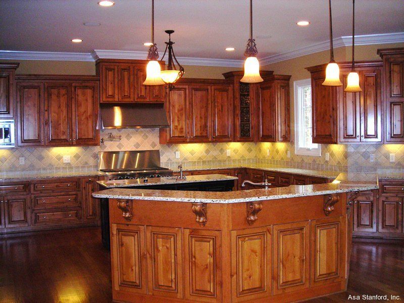 Custom Kitchen Cabinets, Countertops and Lighting.
