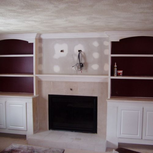 Custom built-ins and fireplace surround for a cust