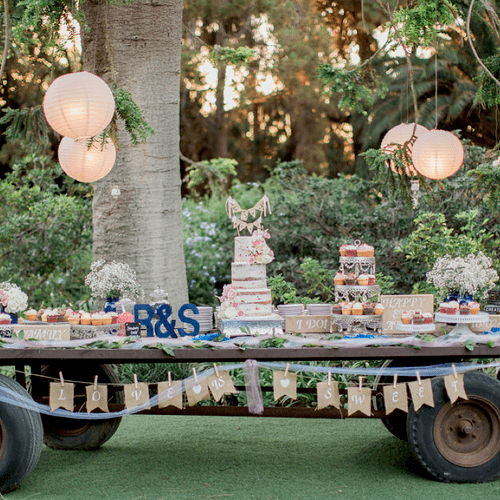 Sweet table we designed with naked cake as centerp