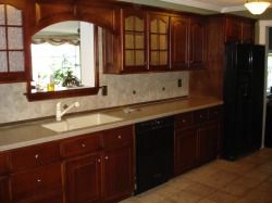 cabinets after a complete refinish and darker cher