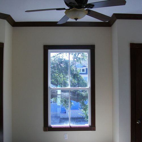 Crown molding, door and window trim, all stained d