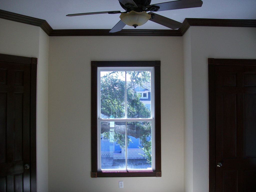 Crown molding, door and window trim, all stained d