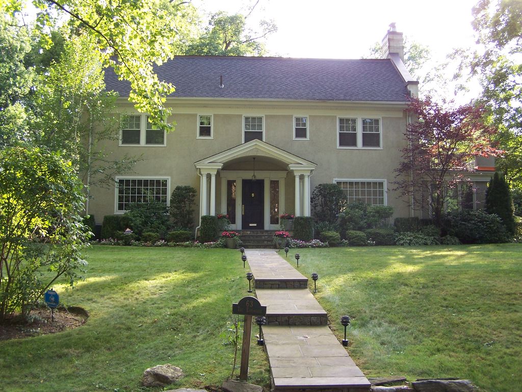 New Rochelle:  Stucco, Windows, Front Entrance.