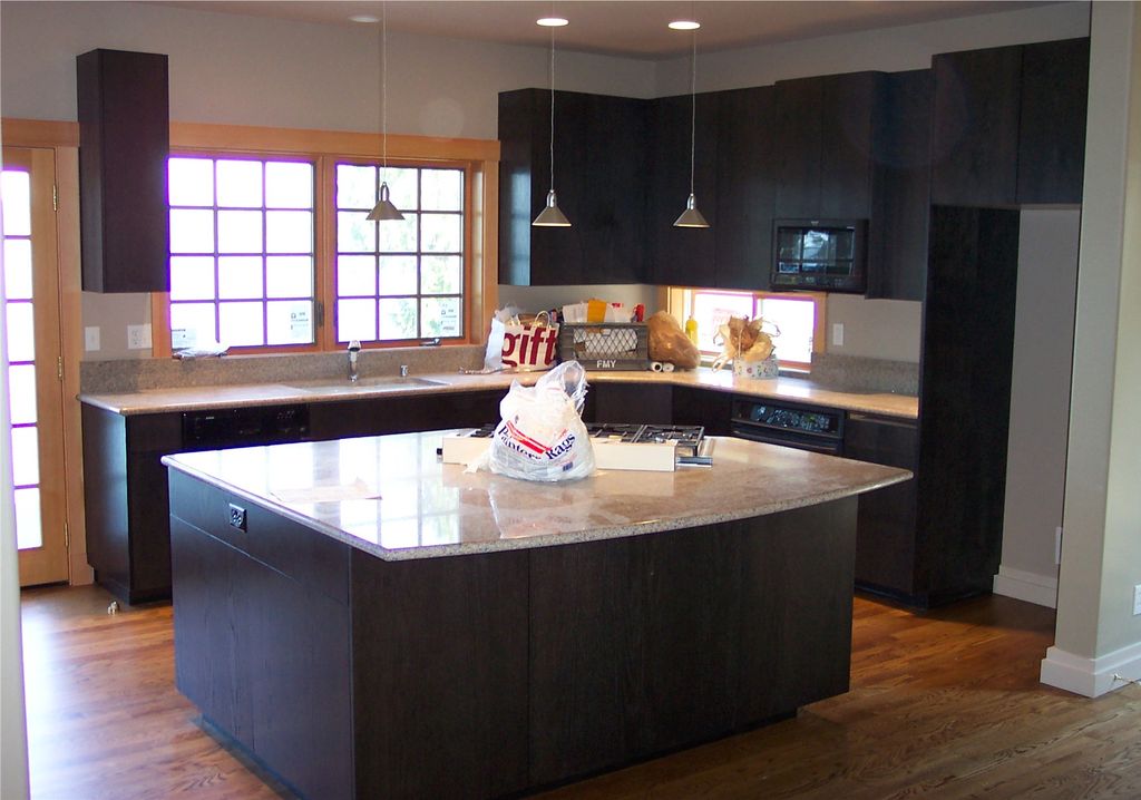 Black stained oak cabinetry.