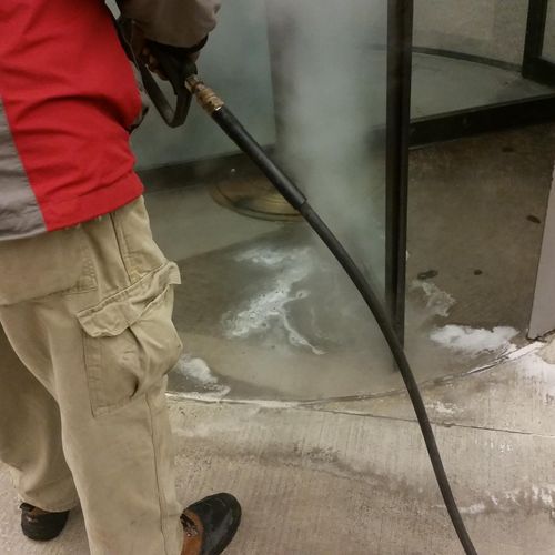 Hot Pressure Washing for baked-on foot traffic