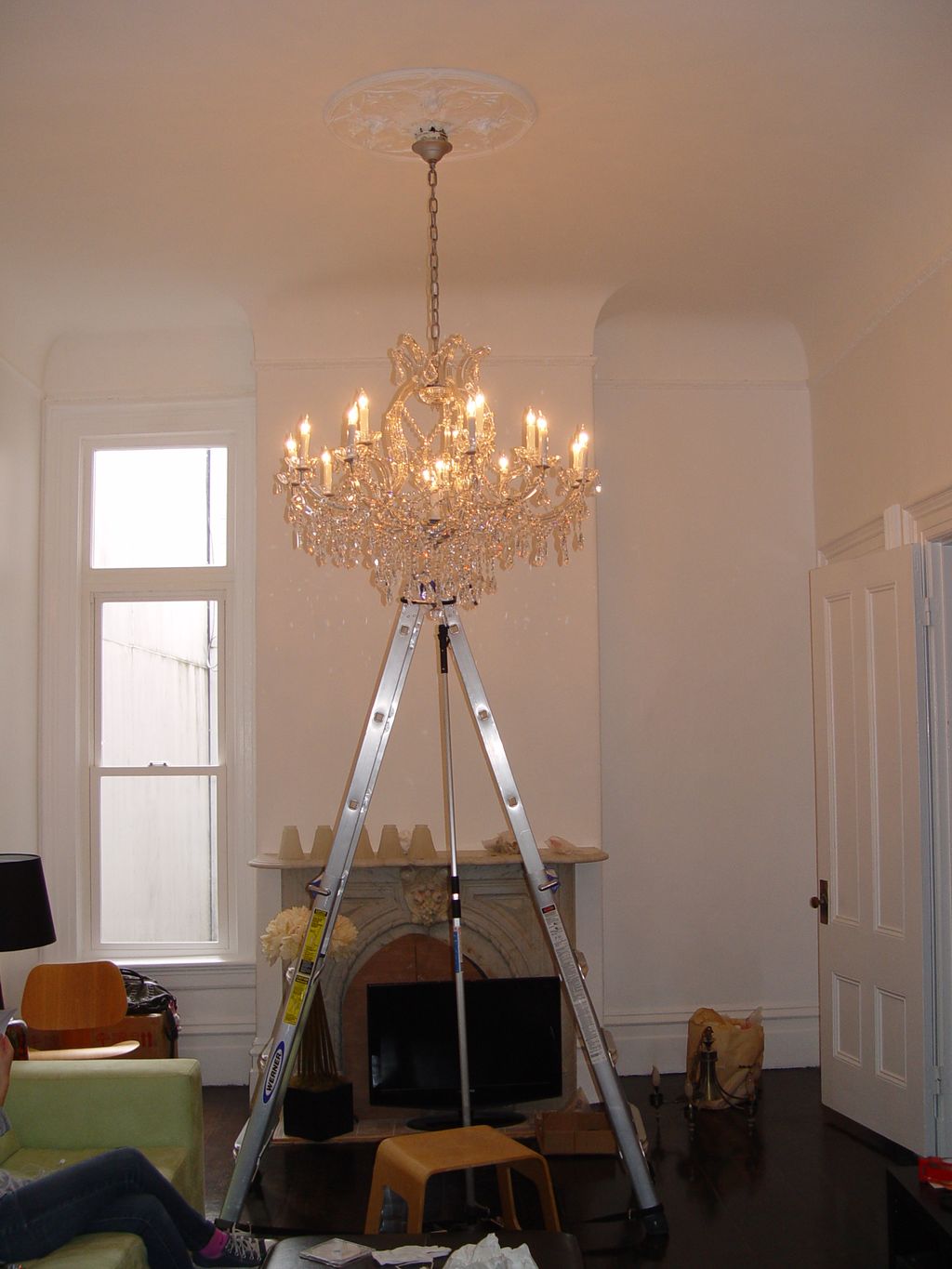 Chandelier wired and hung from gas tube fixture on