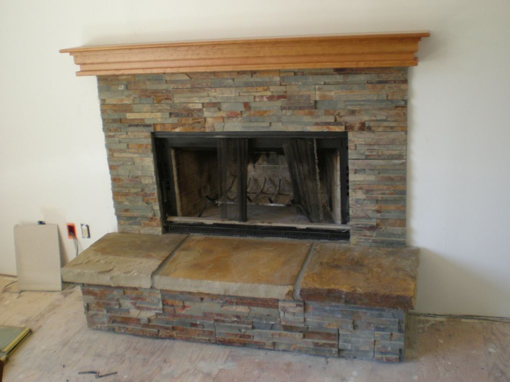 real stone: slate panels with (3) 20'x20'x3" slate