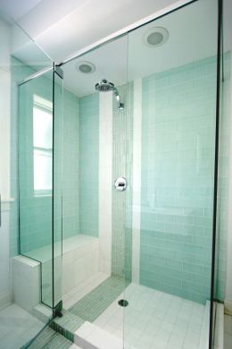 A tile and glass shower by Stratagem Construction