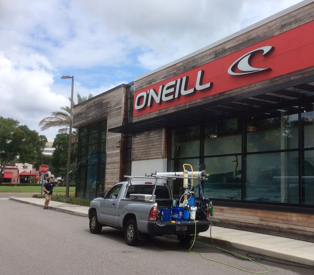 Commercial store front window cleaning