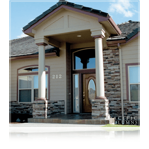 Beautiful Stonework, Columns, And Siding as Well a