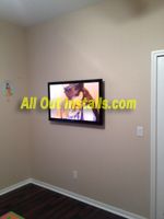 42" Flat Screen TV mounted on wall in child's play