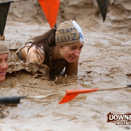 Participating in a Mud Run.