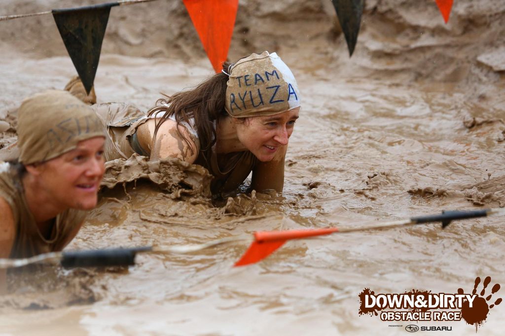 Participating in a Mud Run.