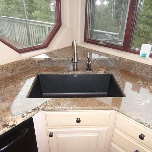 Corner sink with a granite shelf