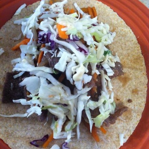 Korean Tacos topped with a Jalapeno Coleslaw