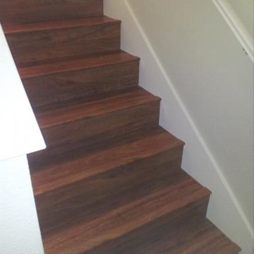 Laminate Stairs: Replaced carpet to glued-down lam