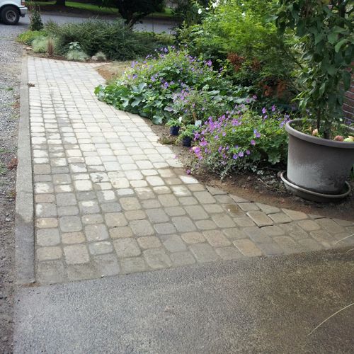 Paver walkway which also widens the driveway.