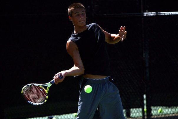Ripping a forehand at my old tennis academy: Advan