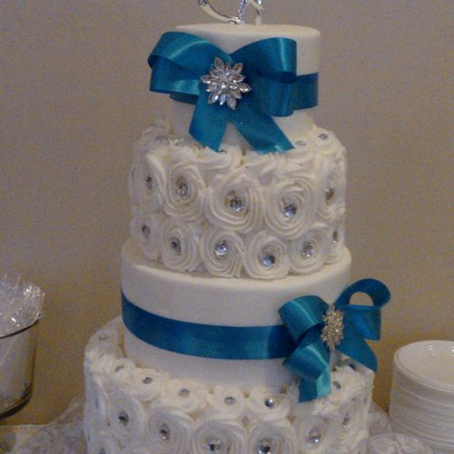 Rosettes & Turquoise Wedding cake.