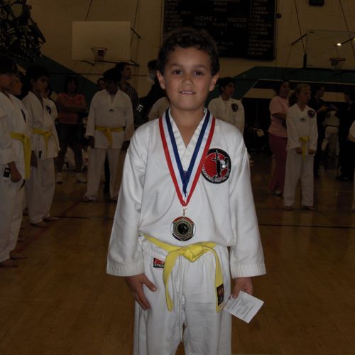 My Son Josiah yellow belt Judo sweep winner