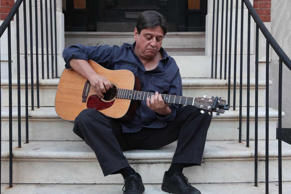 On my front steps, playing my Martin.