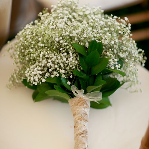 Bouquet of gypsophila  tied with burlap  and chiff