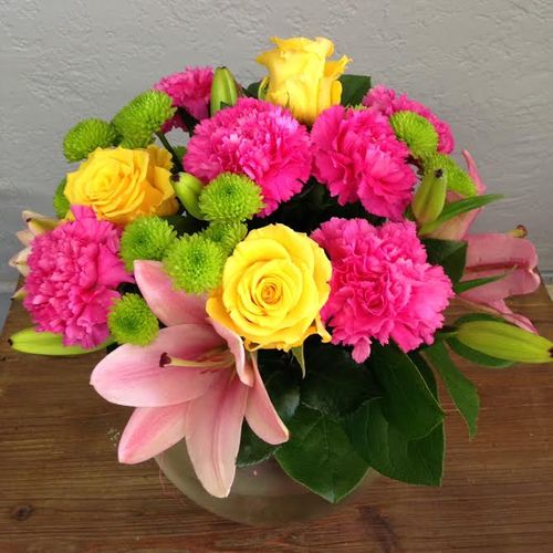 Sweet arrangement of Roses, Lilies, Carnations, an