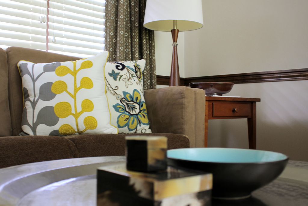 living room refreshed with colorful accent pillows