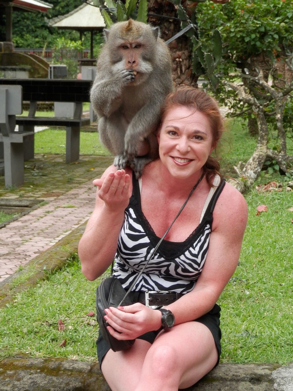 Me in Bali feeding a monkey at the monkey forrest.