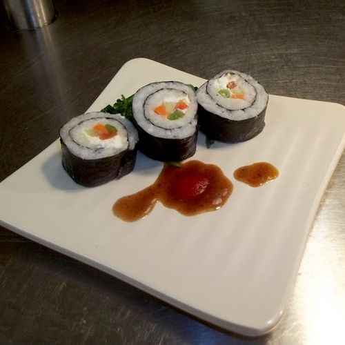 sushi rolls with a soy ginger sauce