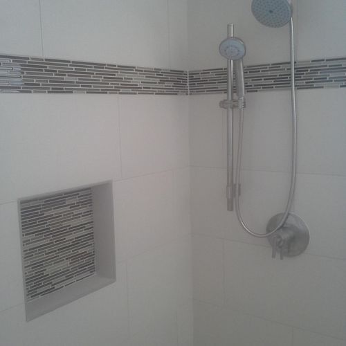 Custom shower with a recessed shampoo shelf, 12"X2